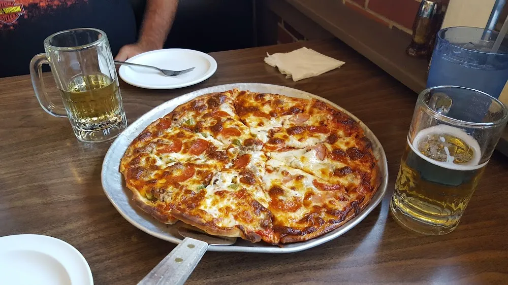 1 2 Meat Lovers 1 2 Supreme with Sauerkraut Pizza